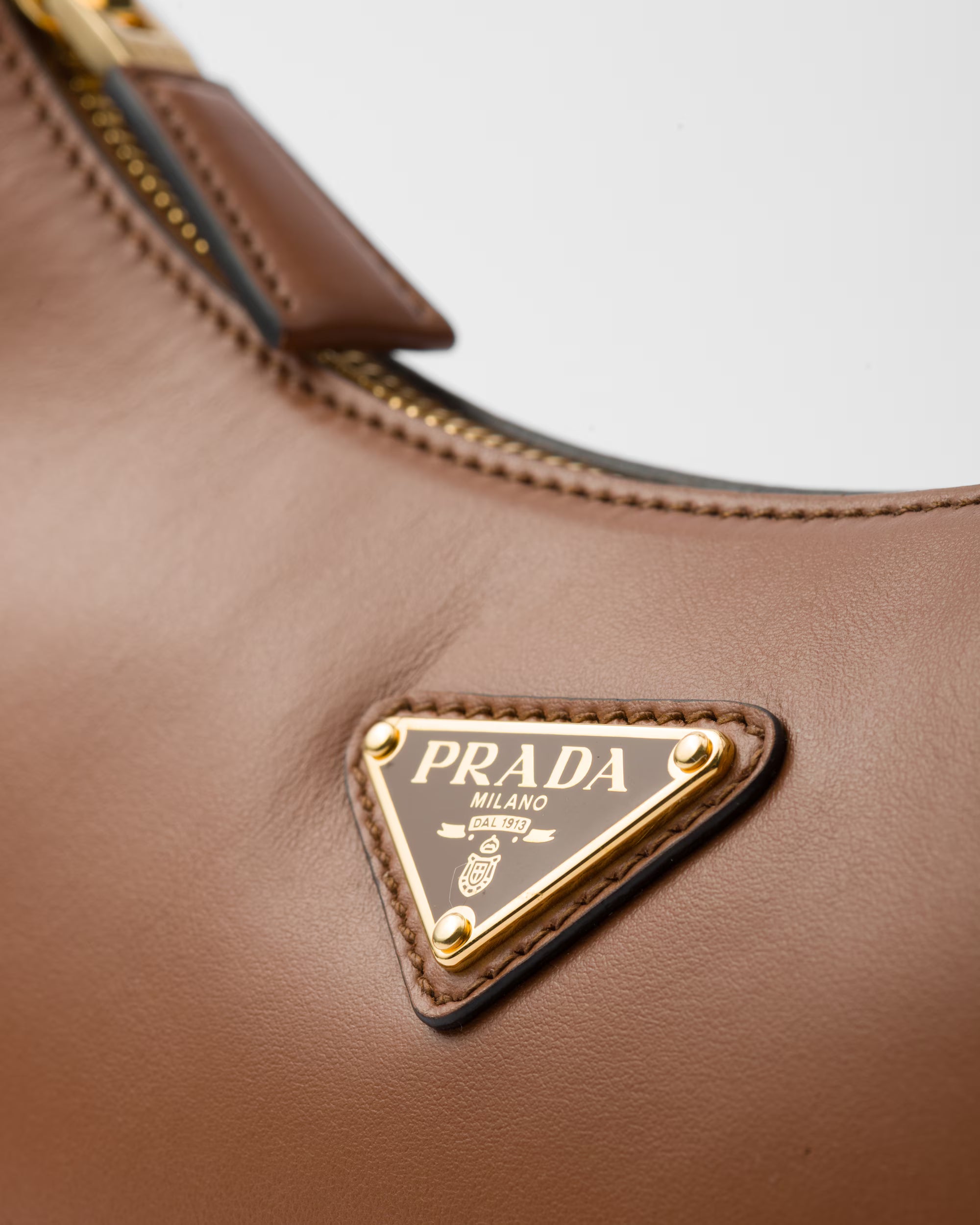 Prada Arqué small leather shoulder bag